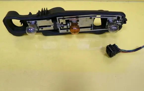 Dacia Logan I Tail light bulb cover holder 