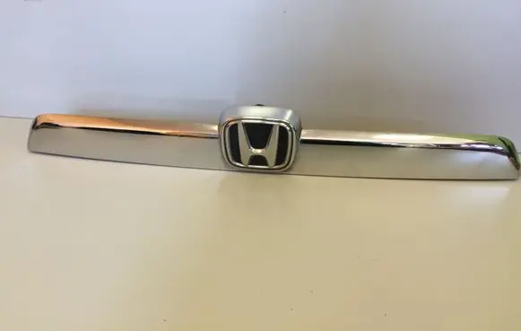 Trunk door license plate light bar