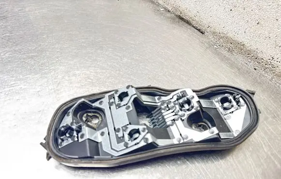 Opel Corsa D Tail light bulb cover holder 89037853