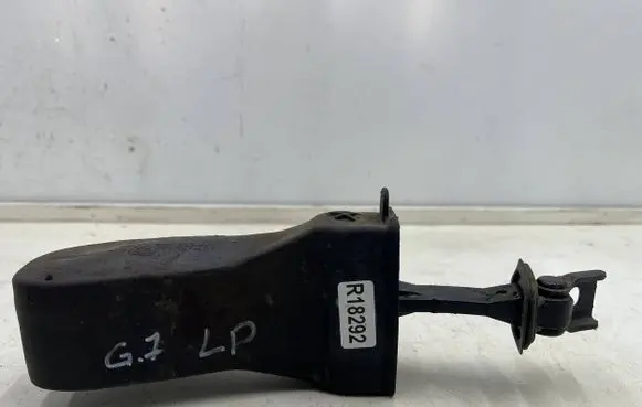 Front door check strap stopper