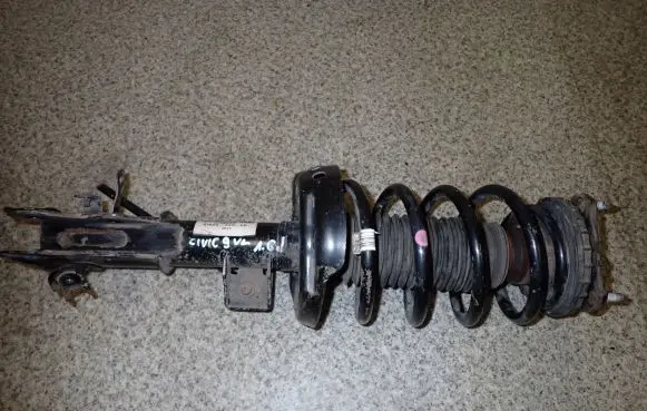 Honda Civic IX Front shock absorber with coil spring