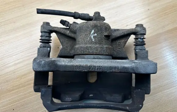 Volkswagen PASSAT B8 Front brake caliper