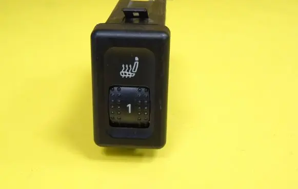 Seat heating switch