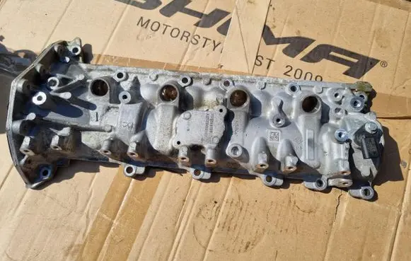 Rocker cam cover