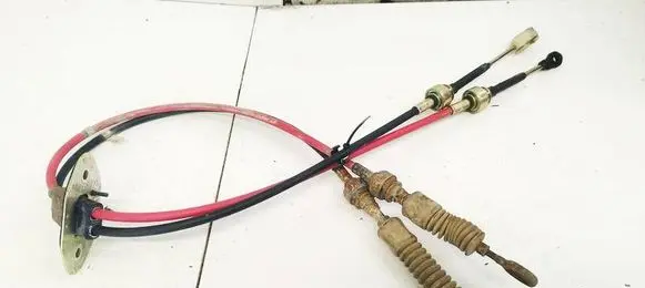 KIA Sportage Gear shift cable linkage 1F0005J22