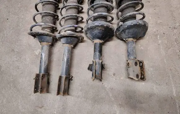 Subaru Impreza II Set of springs and shock absorbers (Front and rear) 