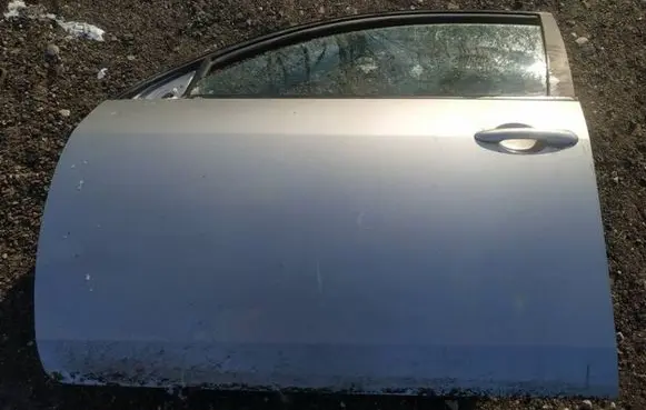 Nissan Primera Front door pilkos