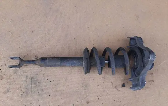 Front shock absorber with coil spring