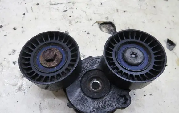 Jaguar XF X260 Timing belt tensioner GMAUTO4574097