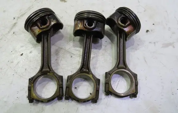 Opel Corsa E Piston with connecting rod GMAUTO4574097