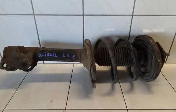 Nissan X-Trail T30 Front shock absorber with coil spring
