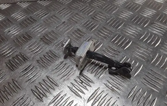 Nissan Note (E11) Front door check strap stopper
