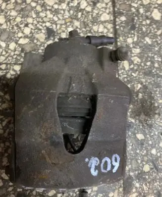 Volkswagen Golf V Front brake caliper