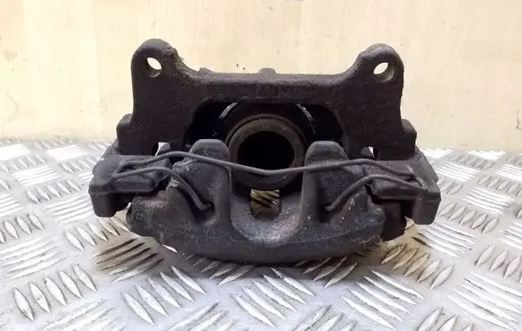 Volkswagen PASSAT B7 Front brake caliper