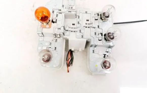 Volvo S40 Tail light bulb cover holder