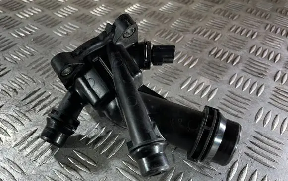 Thermostat/thermostat housing