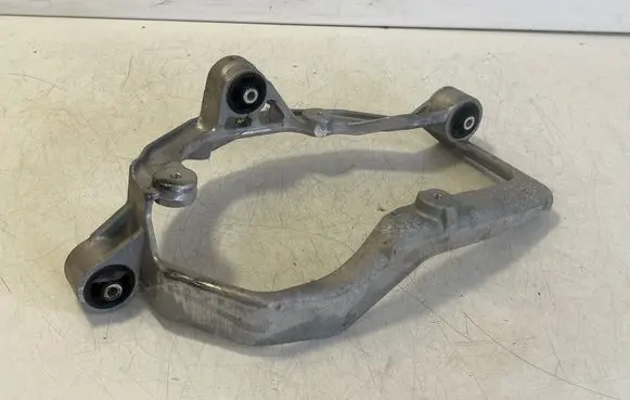 Tesla Model S A/C compressor mount bracket 1037854
