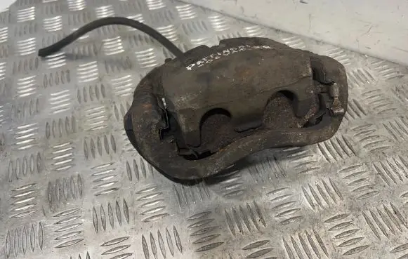 Nissan Pathfinder R51 Front brake caliper