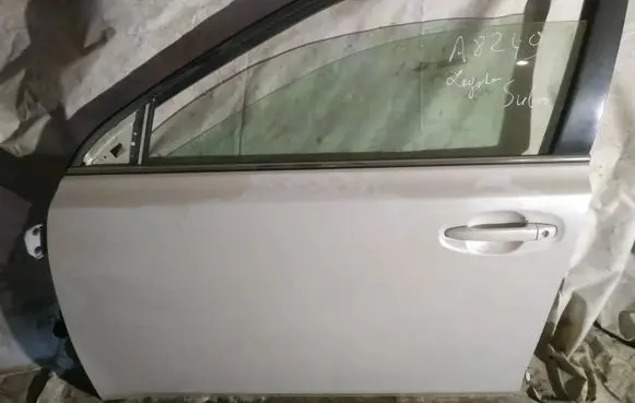 Subaru Legacy Front door baltos