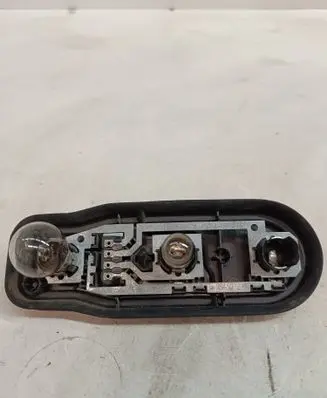 Tail light bulb cover holder