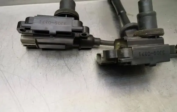 Suzuki Swift I High voltage ignition coil 146060LC 1Z6060T8