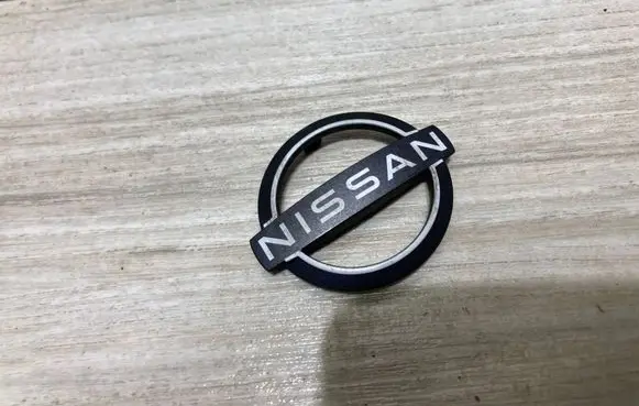 Nissan Juke II F16 Manufacturer badge logo/emblem nse0151