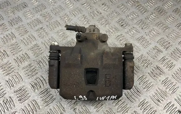 Subaru Impreza I Front brake caliper