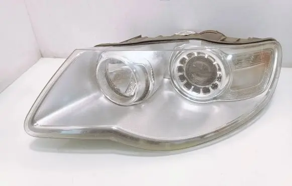 Volkswagen Touareg I Headlight/headlamp 7L6941031A 1LL24703203 24703203000006