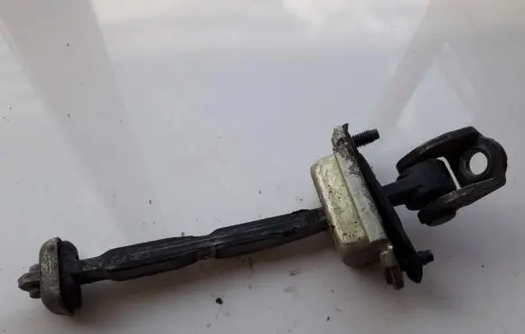 Ford Focus Rear door check strap stopper