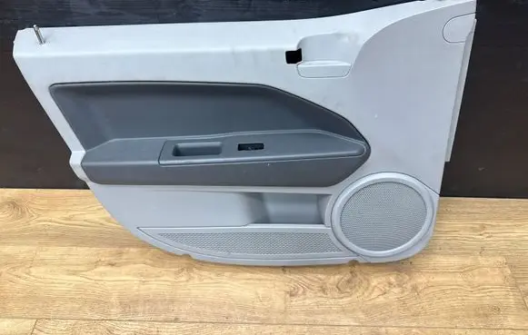 Dodge Caliber Front door card panel trim 8107850