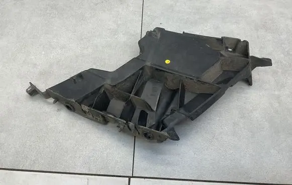 Front bumper mounting bracket