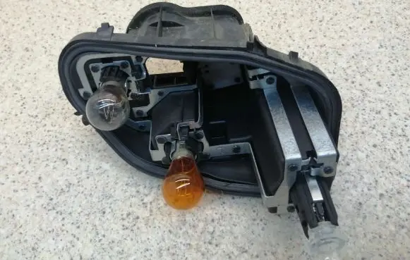 Opel Corsa F Tail light bulb cover holder