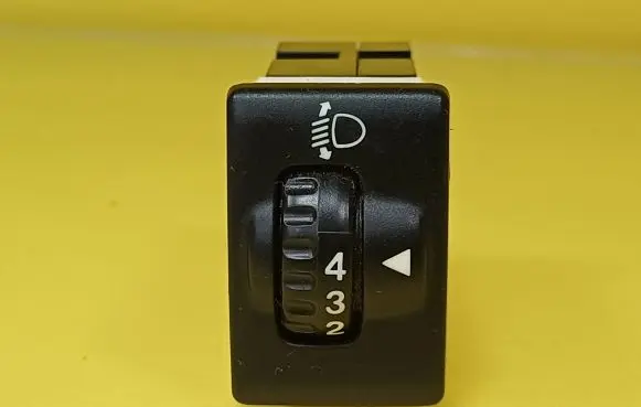 Suzuki Liana Headlight level height control switch 32932074