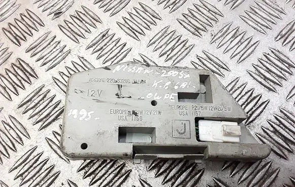 Nissan 200 SX Tail light bulb cover holder 22063288