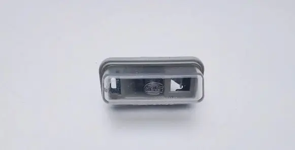 Toyota Avensis T250 Number plate light E1001479
