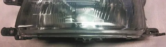 Mazda 323 Headlight/headlamp 216-1107L 2161107L