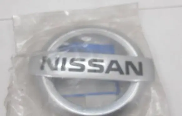 Nissan Primastar Manufacturer badge logo/emblem 62311-00Q0A