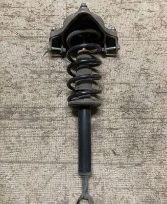 Front shock absorber with coil spring