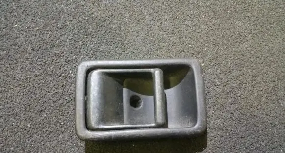 Mazda 323 Rear door interior handle