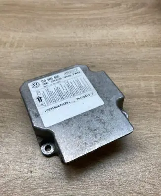 Volkswagen Touran I Airbag control unit/module 1T0909605