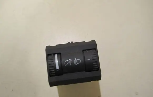 Panel lighting control switch