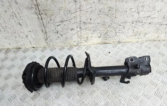 Nissan Juke I F15 Front shock absorber with coil spring 65221374 99003613