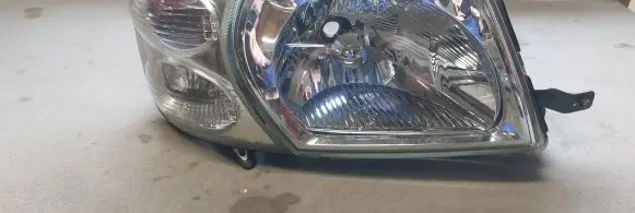 Nissan Patrol Y61 Headlight/headlamp E13250742