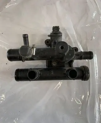 Thermostat/thermostat housing