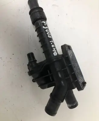 Thermostat/thermostat housing