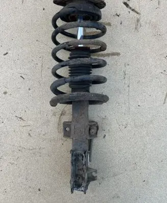 Volvo V70 Front shock absorber/damper 8667250 100509