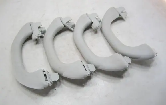 Volkswagen Golf VI A set of handles for the ceiling 1K0857607N