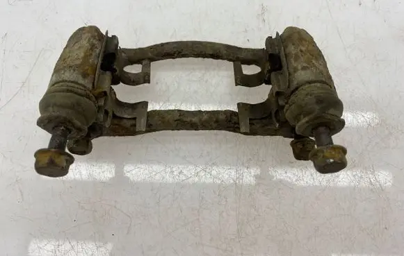 Subaru Forester SG Brake caliper pad carrier rear 