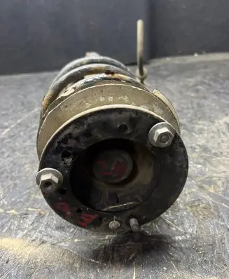 Front shock absorber with coil spring