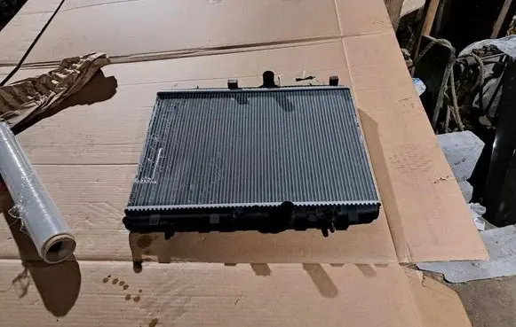 Peugeot 208 I Coolant radiator 1330P8